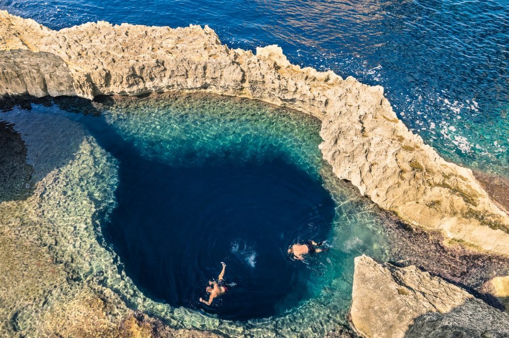 Deep blue hole at the world famous Azure Window in Gozo island -