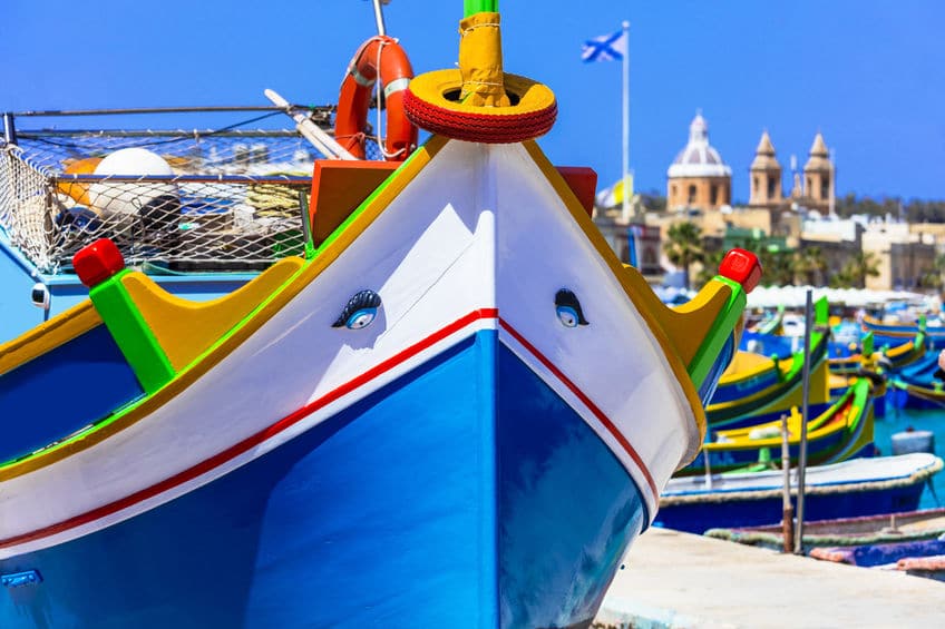 traditional colorful fishing boats luzzu in Malta